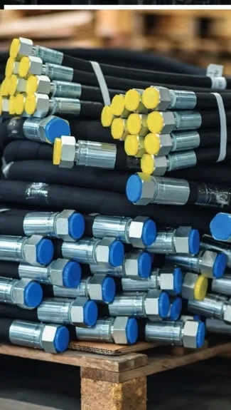 Stacks of hydraulic hoses with protective end caps