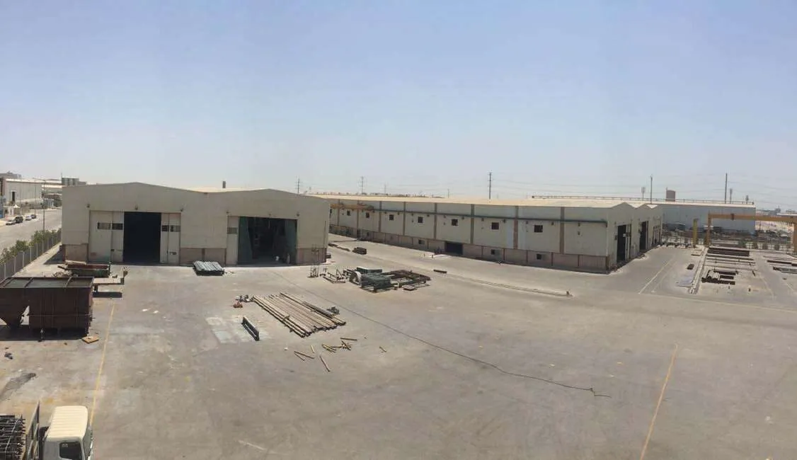 Steel facility buildings and open yard