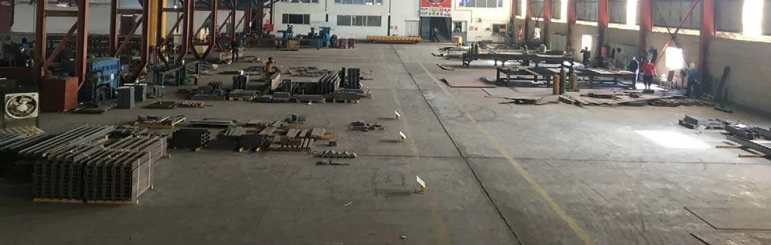 Steel beams and equipment on the workshop floor