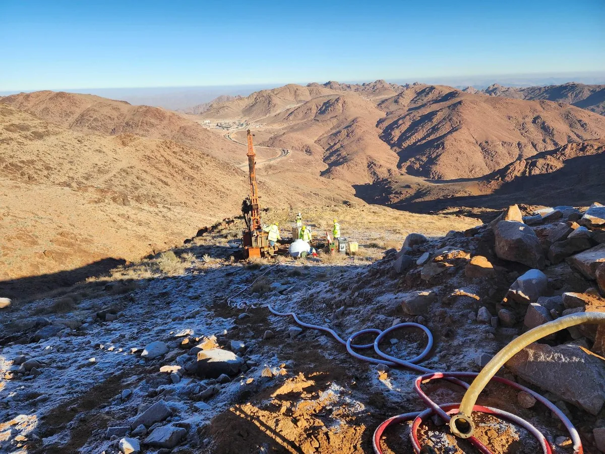 Drilling equipment set up among rocky hills